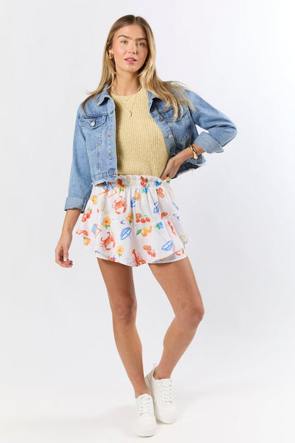 Summer Mirage Ivory Icon Print Ruffle Hem Shorts - ShopLorca